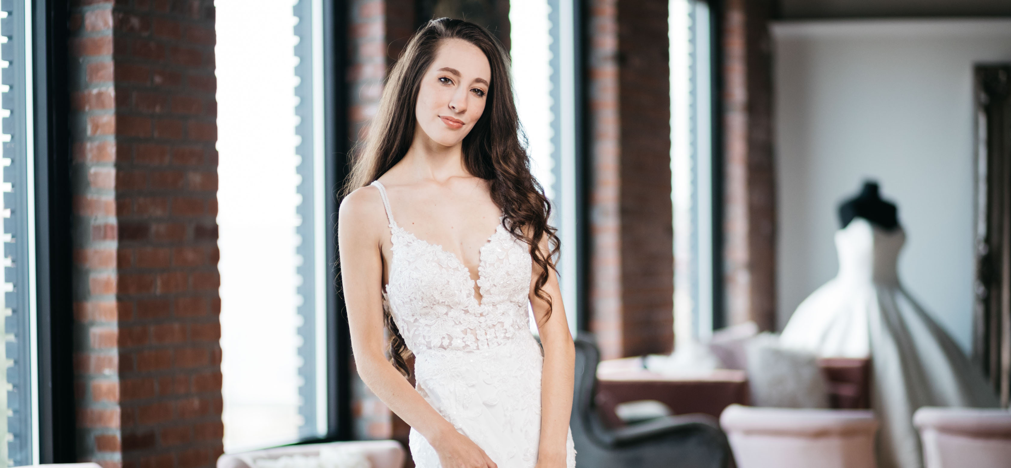 A bridal party smiling and drinking champagne.